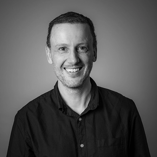 A headshot image of the Open Box staff member.