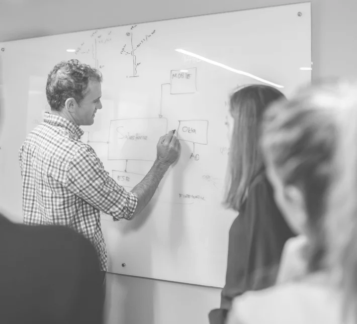 Man drawing on whiteboard