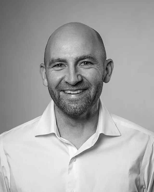 A headshot image of the Open Box staff member.